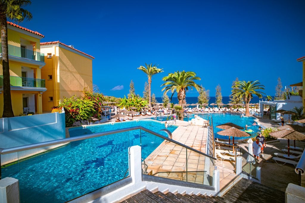 Pool with wooden bridge, Malama Beach Holiday Village