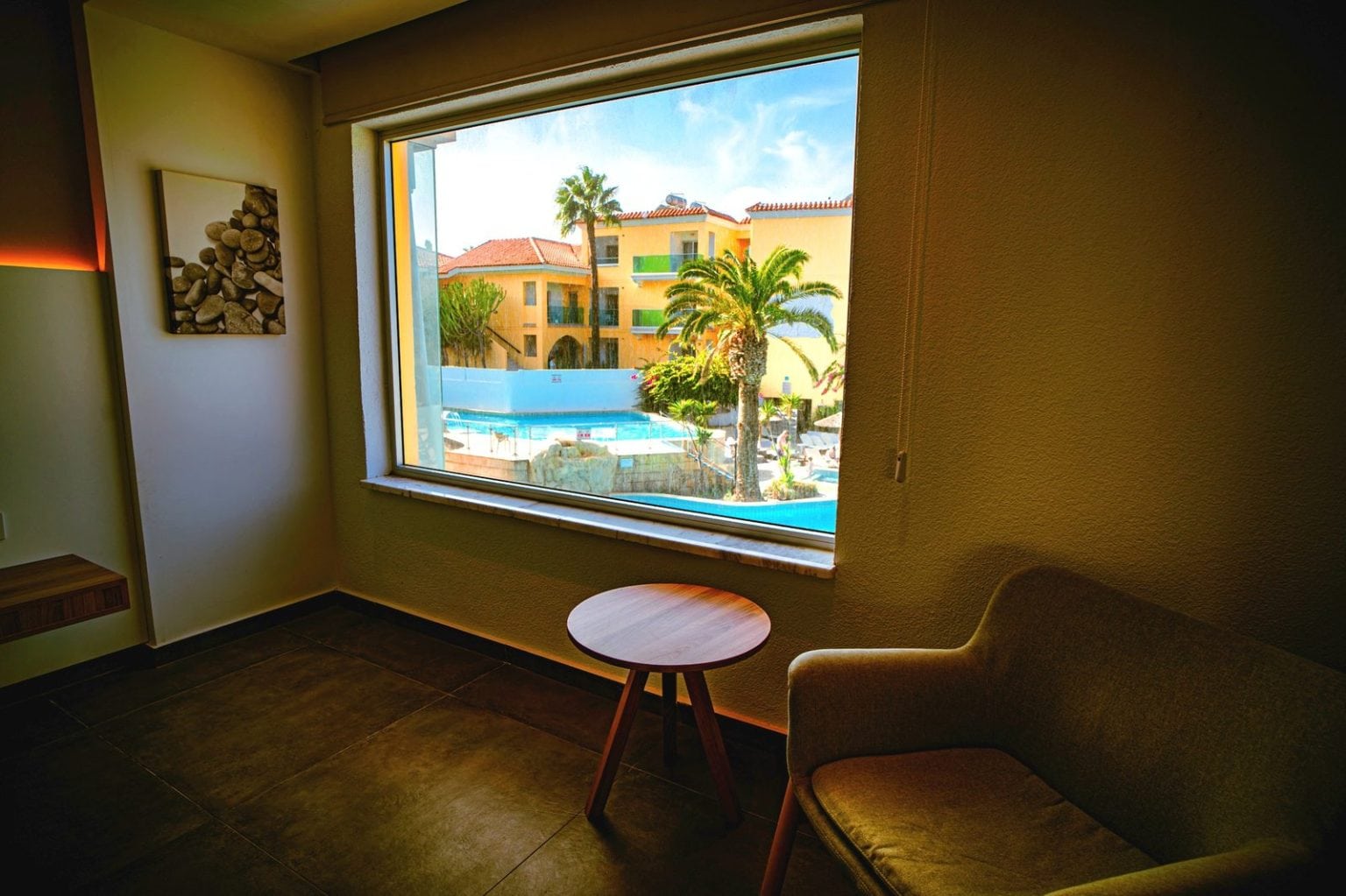 Deluxe Suite window looking over the pool at Malama Beach Holiday Village