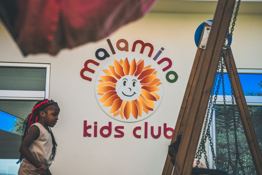 The Malamino Kids' Club sign beside the playground at Malama Beach Holiday Village, Protaras